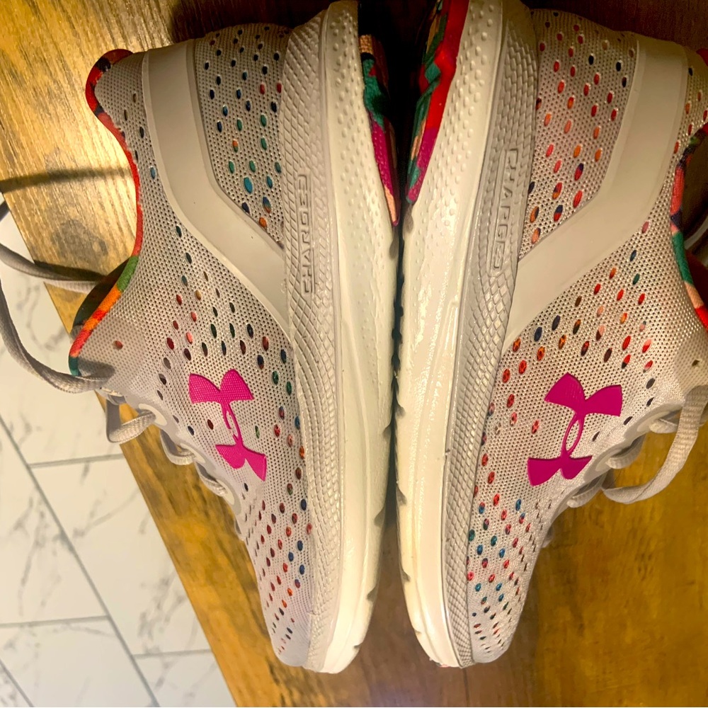 Size 7.5 women’s Charged Impulse Floral running shoes.